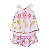 Young girls two piece outfit with red flower pattern.
