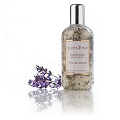 Creative product shot of Parseme bath salts with sprig of lavender.