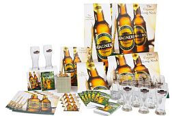 Complex group shot of promotional materials including posters, glasses and mats for Magners.