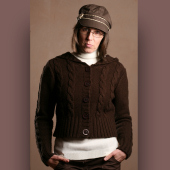 Brown jumper and hat worn by model.